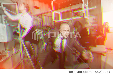 Tensed businessman running Tensed businessman running 53010225