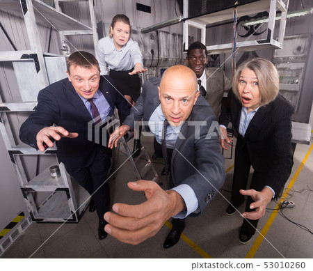 People solving puzzles in escape room People solving puzzles in escape room 53010260