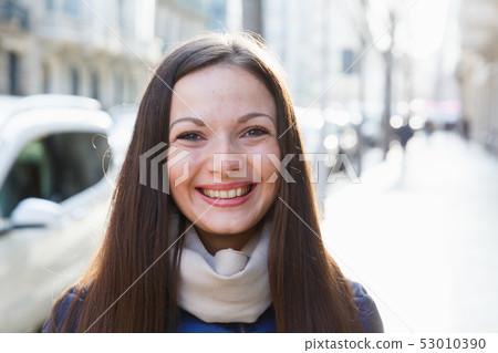 Portrait of cheerful young woman in the jacket Portrait of cheerful young woman in the jacket 53010390