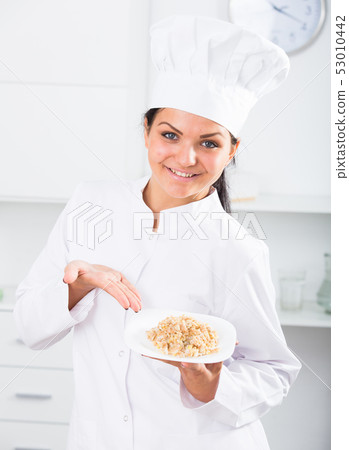 Brunette girl cook Brunette girl cook 53010442