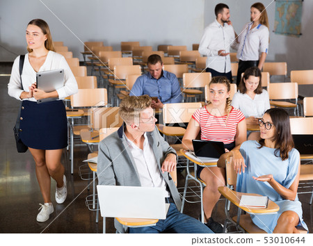 Students enjoying free time in class 53010644