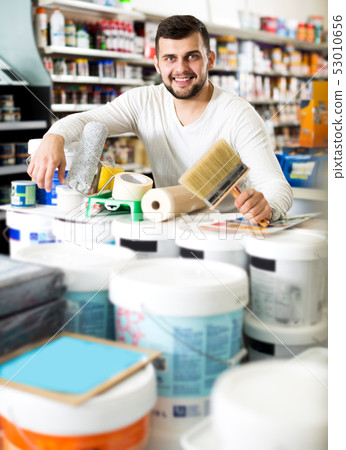 Male customer purchasing tools for house improvements Male customer purchasing tools for house improvements 53010656