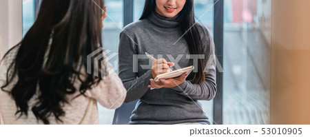 Banner of Asian woman professional psychologist doctor giving the consult to female patients in modern living room of house or hospital exam room, Mental health Concept Banner of Asian woman professional psychologist doctor giving the consult to female patients in modern living room of house or hospital exam room, Mental health Concept 53010905