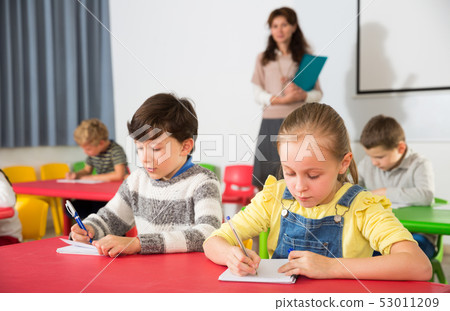 Pupils working in classroom 53011209