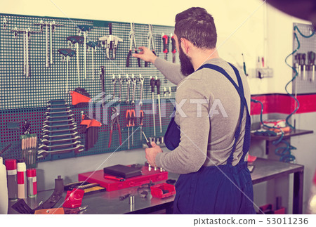 Young man is ready to use his tools 53011236