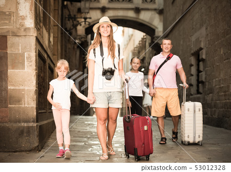 Big family of tourists strolling 53012328