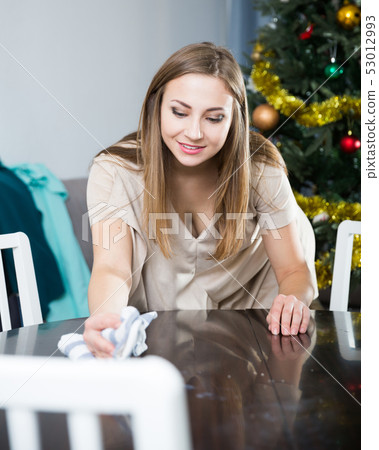 Girl wiping table Girl wiping table 53012993