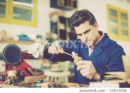 Carpenter working in studio 53013056
