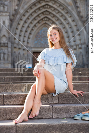 Girl sitting near temple 53013291
