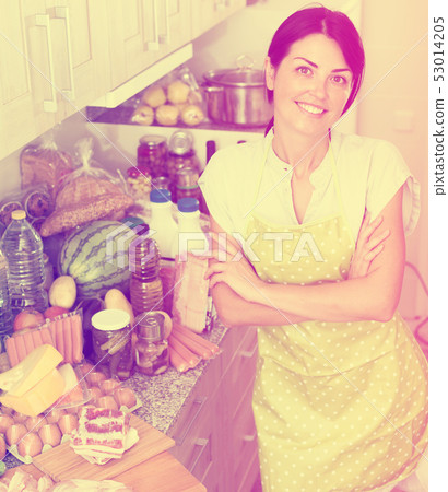 Female is posing in time cooking Female is posing in time cooking 53014205
