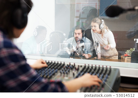 Presenters in live radio show Presenters in live radio show 53014512