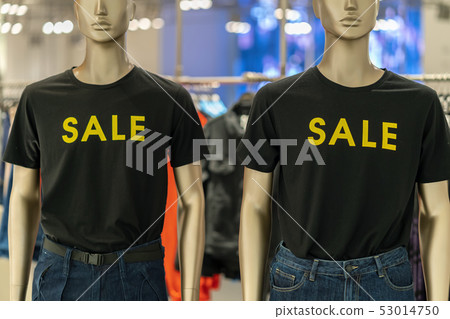 Part of female mannequin dressed in casual clothes with SALE text in the shopping department store for shopping, business fashion and advertisement concept Part of female mannequin dressed in casual clothes with SALE text in the shopping department store for shopping, business fashion and advertisement concept 53014750