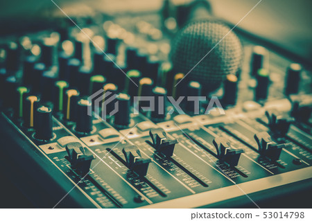 Closeup some part of audio mixer, vintage film style, music equipment concept Closeup some part of audio mixer, vintage film style, music equipment concept 53014798