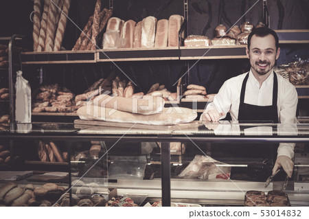 Seller offering fresh tasty bun Seller offering fresh tasty bun 53014832