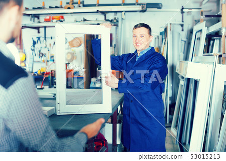 Professional labour demonstrating PVC profiles Professional labour demonstrating PVC profiles 53015213
