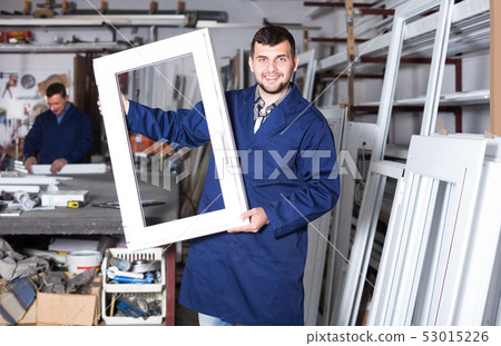 active male professional labours with finished PVC profiles and windows 53015226