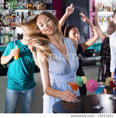 Woman is having fun in the nightclub Woman is having fun in the nightclub 53015262