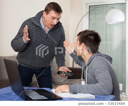 Father unhappy with how teenage son learns Father unhappy with how teenage son learns 53015484