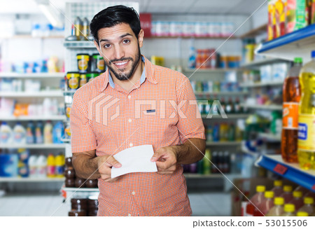 male with note list for looking goods male with note list for looking goods 53015506