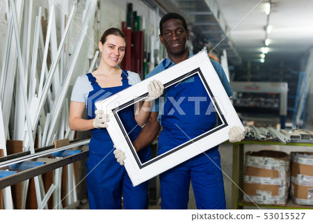 Adult masters are holding modern window frames 53015527