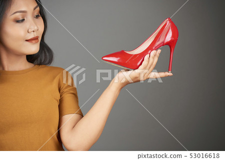Fashionista choosing pumps 53016618