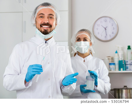 Woman nurse and man doctor ready to work in office 53016794