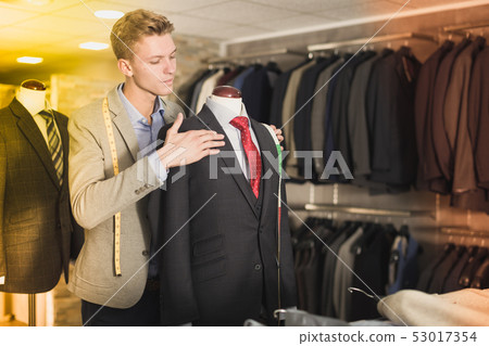 man seller measuring business style jacket man seller measuring business style jacket 53017354