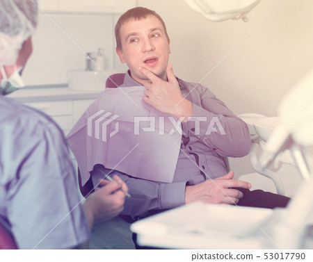 adult dentist woman with patient adult dentist woman with patient 53017790