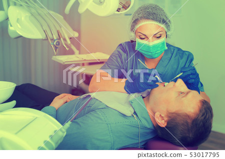 dentist professional filling teeth for man dentist professional filling teeth for man 53017795