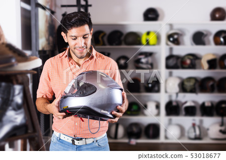 customer is choosing modern helmet 53018677