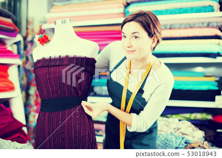 Tailor working at dress Tailor working at dress 53018943