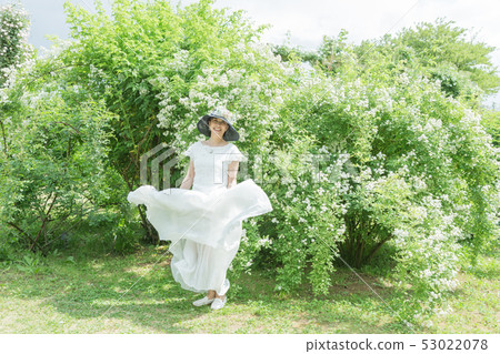 Rose garden Women expressing joy Rose flower Rose Flower garden Rose garden Women expressing joy Rose flower Rose Flower garden 53022078