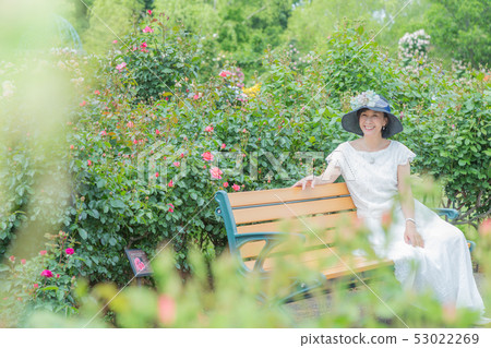  Rose garden Women expressing joy Rose flower Rose Flower garden 53022269