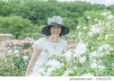  Rose garden Women expressing joy Rose flower Rose Flower garden 53022276