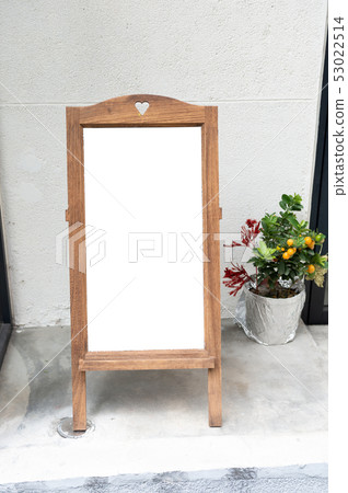 Large blank billboard on a street wall, banners 53022514