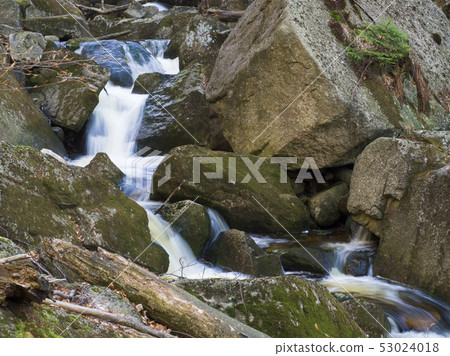 long exposure waterfal cascade in Jizerske hory, Jizera mountain, forest on Cerny Stolpich black 53024018