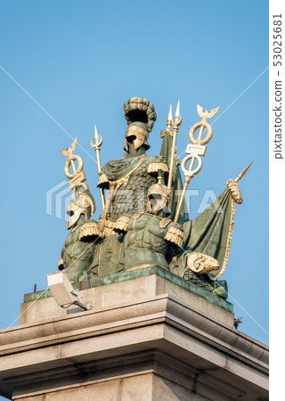 Sculpture of military athletes adorns the bridge 53025681