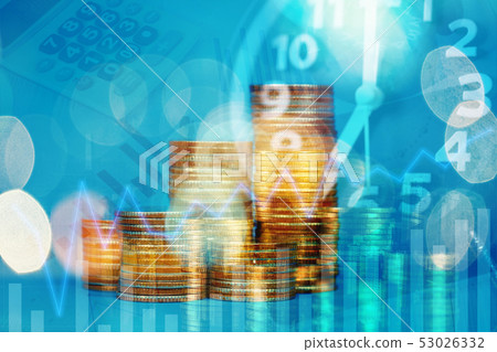 Double exposure of coins stack with alarm clock 53026332