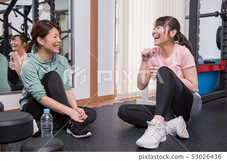 Woman taking a break at the gym 53026436