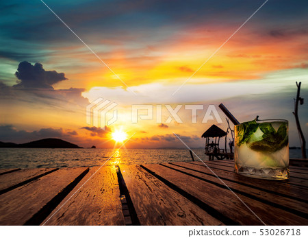 Mojito drinking with sunset in Koh Mak resort Mojito drinking with sunset in Koh Mak resort 53026718
