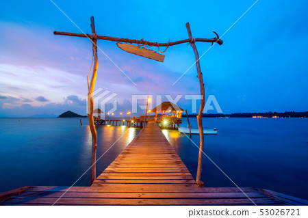 Wooded bridge in Koh Nak with sunset sky Wooded bridge in Koh Nak with sunset sky 53026721