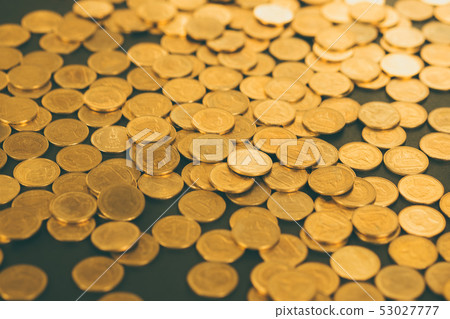 Piles of coins on black background, business and 53027777