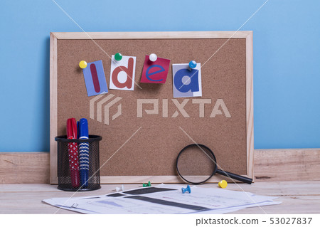 Colorful paper word IDEA with Magnifying glass  53027837