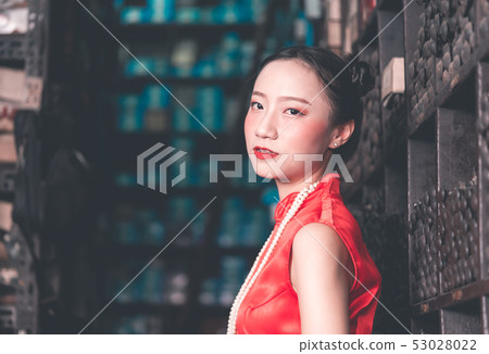 Chinese woman in a steel metal rod industrial 53028022