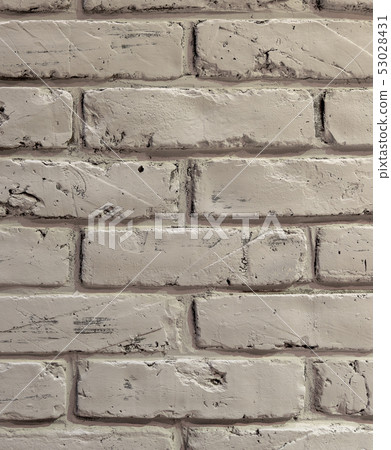 Brick textured white wall closeup. Background. Brick textured white wall closeup. Background. 53028431