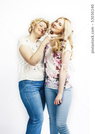 mother with daughter together posing happy smiling isolated on white background, lifestyle people 53030140
