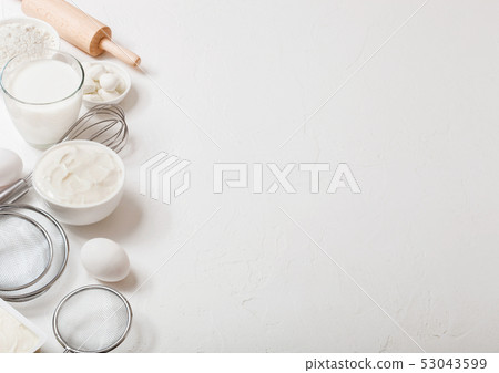 Fresh dairy products on white table background. 53043599