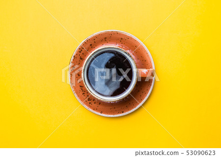 Coffe cup on yellow 53090623