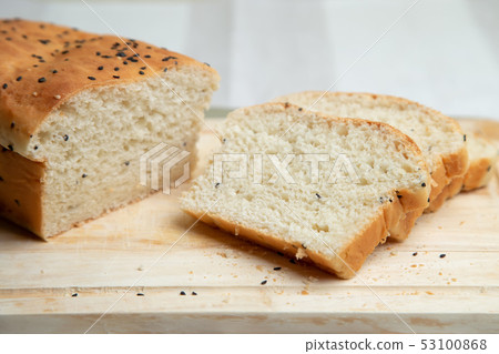 Homemade white bread with sesame. 53100868