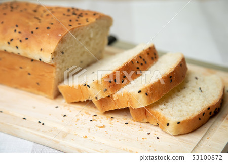 Homemade white bread with sesame. 53100872